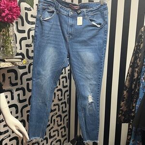 #216 Crystal Roc skinny jeans with distressed bottom leg